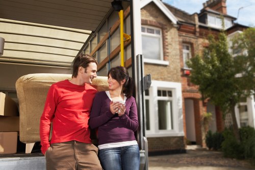 Beckton office moving service with labelled boxes and furniture